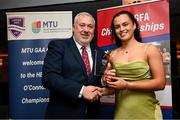 22 March 2024; Emma Duggan of DCU Dóchas Éireann receives her All-Star award from Ladies HEC chairperson Daniel Caldwell during the 2024 HEC All Stars awards night at the Dublin Bonnington Hotel in Dublin. Photo by Ramsey Cardy/Sportsfile