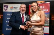 22 March 2024; Sadhbh Fisher of Maynooth University receives her Rising Star award from Ladies HEC chairperson Daniel Caldwell during the 2024 HEC All Stars awards night at the Dublin Bonnington Hotel in Dublin. Photo by Ramsey Cardy/Sportsfile