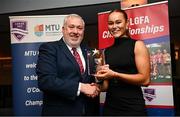 22 March 2024; Kate Kenny of DCU Dóchas Éireann receives her All-Star award from Ladies HEC chairperson Daniel Caldwell during the 2024 HEC All Stars awards night at the Dublin Bonnington Hotel in Dublin. Photo by Ramsey Cardy/Sportsfile