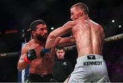 22 March 2024; Patricio Pitbull, left, in action against Jeremy Kennedy in their featherweight title bout during the Bellator Champions Series at the SSE Arena in Belfast. Photo by David Fitzgerald/Sportsfile