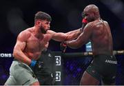 22 March 2024; Karl Moore, left, in action against Corey Anderson in their light heavyweight title bout during the Bellator Champions Series at the SSE Arena in Belfast. Photo by David Fitzgerald/Sportsfile