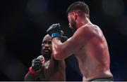 22 March 2024; Corey Anderson, left, in action against Karl Moore in their light heavyweight title bout during the Bellator Champions Series at the SSE Arena in Belfast. Photo by David Fitzgerald/Sportsfile