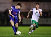 22 March 2024; Thomas Considine of Treaty United  in action against Evan Mclaughlin of Cork City during the SSE Airtricity Men's First Division match between Treaty United and Cork City at Markets Field in Limerick. Photo by Michael P Ryan/Sportsfile