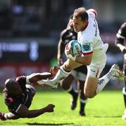 23 March 2024; Will Addison of Ulster is tackled by Makazole Mapimpi of Hollywoodbets Sharks during the United Rugby Championship match between Hollywoodbets Sharks and Ulster at Hollywoodbets Kings Park in Durban, South Africa. Photo by Shaun Roy/Sportsfile