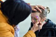 23 March 2024; Armagh supporter Holly Casey, age 7, from Lurgan, has her face painted before the Lidl LGFA National League Division 1 match between Armagh and Dublin at BOX-IT Athletic Grounds in Armagh. Photo by Ben McShane/Sportsfile