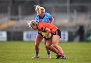 23 March 2024; Laura Kavanagh of Armagh is tackled by Carla Rowe of Dublin during the Lidl LGFA National League Division 1 match between Armagh and Dublin at BOX-IT Athletic Grounds in Armagh. Photo by Ben McShane/Sportsfile