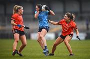 23 March 2024; Hannah Tyrrell of Dublin evades the tackled of Kelly Mallon, left, and Clodagh McCambridge of Armagh during the Lidl LGFA National League Division 1 match between Armagh and Dublin at BOX-IT Athletic Grounds in Armagh. Photo by Ben McShane/Sportsfile