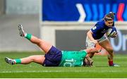 23 March 2024; Agathe Sochat of France is tackled by Nicole Fowley of Ireland during the Women's Six Nations Rugby Championship match between France and Ireland at Stade Marie-Marvingt in Le Mans, France. Photo by Hugo Pfeiffer/Sportsfile
