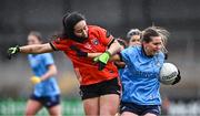 23 March 2024; Martha Byrne of Dublin in action against Moya Feehan of Armagh during the Lidl LGFA National League Division 1 match between Armagh and Dublin at BOX-IT Athletic Grounds in Armagh. Photo by Ben McShane/Sportsfile