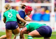 23 March 2024; Charlotte Escudero of France is tackled by Aoibheann Reilly, left, and Christy Haney of Ireland the Women's Six Nations Rugby Championship match between France and Ireland at Stade Marie-Marvingt in Le Mans, France. Photo by Hugo Pfeiffer/Sportsfile