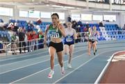 23 March 2024; Zoe Kenny of Ferrybank AC, Waterford, on her way to winning the under 18 girls 4x200 relay during day one of the 123.ie National Juvenile Indoor Championships at the TUS International Arena in Athlone.  Photo by Stephen Marken/Sportsfile