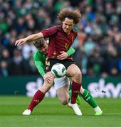 23 March 2024; Wout Faes of Belgium in action against Evan Ferguson of Republic of Ireland during the international friendly match between Republic of Ireland and Belgium at the Aviva Stadium in Dublin. Photo by Stephen McCarthy/Sportsfile