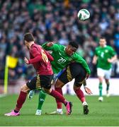 23 March 2024; Chiedozie Ogbene of Republic of Ireland in action against Olivier Deman, left, and Aster Vranckx of Belgium during the international friendly match between Republic of Ireland and Belgium at the Aviva Stadium in Dublin. Photo by Seb Daly/Sportsfile