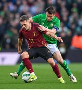 23 March 2024; Leandro Trossard of Belgium in action against Seamus Coleman of Republic of Ireland during the international friendly match between Republic of Ireland and Belgium at the Aviva Stadium in Dublin. Photo by Seb Daly/Sportsfile