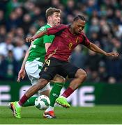 23 March 2024; Loïs Openda of Belgium in action against Nathan Collins of Republic of Ireland during the international friendly match between Republic of Ireland and Belgium at the Aviva Stadium in Dublin. Photo by Stephen McCarthy/Sportsfile