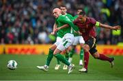 23 March 2024; Will Smallbone of Republic of Ireland in action against Youri Tielemans of Belgium during the international friendly match between Republic of Ireland and Belgium at the Aviva Stadium in Dublin. Photo by Seb Daly/Sportsfile