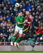 23 March 2024; Josh Cullen of Republic of Ireland in action against Aster Vranckx of Belgium during the international friendly match between Republic of Ireland and Belgium at the Aviva Stadium in Dublin. Photo by Seb Daly/Sportsfile
