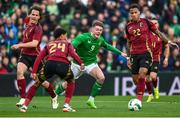 23 March 2024; Evan Ferguson of Republic of Ireland in action against Belgium players, from left, Wout Faes, Koni De Winter and Aster Vranckx during the international friendly match between Republic of Ireland and Belgium at the Aviva Stadium in Dublin. Photo by Stephen McCarthy/Sportsfile