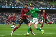 23 March 2024; Evan Ferguson of Republic of Ireland in action against Koni De Winter of Belgium during the international friendly match between Republic of Ireland and Belgium at the Aviva Stadium in Dublin. Photo by Stephen McCarthy/Sportsfile