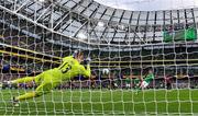 23 March 2024; Belgium goalkeeper Matz Sels saves a penalty from Evan Ferguson of Republic of Ireland during the international friendly match between Republic of Ireland and Belgium at the Aviva Stadium in Dublin. Photo by Seb Daly/Sportsfile