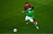 23 March 2024; Chiedozie Ogbene of Republic of Ireland in action against Olivier Deman of Belgium during the international friendly match between Republic of Ireland and Belgium at the Aviva Stadium in Dublin. Photo by David Fitzgerald/Sportsfile