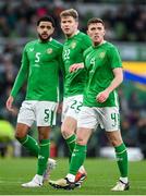 23 March 2024; Republic of Ireland players, from right to left, Dara O'Shea, Nathan Collins and Andrew Omobamidele during the international friendly match between Republic of Ireland and Belgium at the Aviva Stadium in Dublin. Photo by Seb Daly/Sportsfile