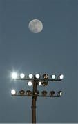 23 March 2024; The moon is seen behind the floodlights before the Allianz Football League Division 2 match between Kildare and Louth at Netwatch Cullen Park in Carlow. Photo by Michael P Ryan/Sportsfile