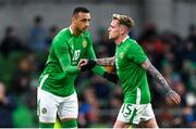 23 March 2024; Adam Idah, left, comes on as a substitute for Sammie Szmodics of Republic of Ireland during the international friendly match between Republic of Ireland and Belgium at the Aviva Stadium in Dublin. Photo by Stephen McCarthy/Sportsfile