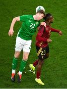 23 March 2024; Nathan Collins of Republic of Ireland in action against Michy Batshuayi of Belgium during the international friendly match between Republic of Ireland and Belgium at the Aviva Stadium in Dublin. Photo by David Fitzgerald/Sportsfile