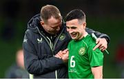 23 March 2024; Josh Cullen of Republic of Ireland and Republic of Ireland assistant coach Glenn Whelan after the international friendly match between Republic of Ireland and Belgium at the Aviva Stadium in Dublin. Photo by Stephen McCarthy/Sportsfile