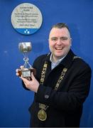 23 March 2024; The Lord Mayor of Dublin Daithí de Róiste with the 1890 Cup at the official unveiling of a plaque by Dublin City Council and the GAA at Clonturk Park in Drumcondra, commemorating it as a location for the All-Ireland hurling and football finals of 1890, 1891, 1892 and 1894. Photo by Ray McManus/Sportsfile