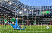 23 March 2024; Republic of Ireland goalkeeper Caoimhin Kelleher makes a save during the international friendly match between Republic of Ireland and Belgium at the Aviva Stadium in Dublin. Photo by Seb Daly/Sportsfile