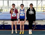 23 March 2024; Medalists in the girls under 13 high jump from left, Sophie O'Flaherty of Lios Tuathail AC, Kerry, Jasmine Barrett Doherty of Finn Valley AC, Donegal, and Maya Mobius of Blackrock AC, Dublin, during day one of the 123.ie National Juvenile Indoor Championships at the TUS International Arena in Athlone.  Photo by Stephen Marken/Sportsfile