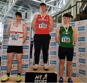 23 March 2024; Medalists from left, Corey Scanlan of Finisk Valley AC, Waterford, Andrew Cooper of Gowran AC, Kilkenny, and Rory McNally of Kilcoole AC, Wicklow, after the boys under 19 shotput during day one of the 123.ie National Juvenile Indoor Championships at the TUS International Arena in Athlone.  Photo by Stephen Marken/Sportsfile