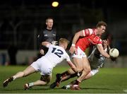 23 March 2024; Conor Grimes of Louth in action against Kildare players, Shane Farrell, left, and Shea Ryan during the Allianz Football League Division 2 match between Kildare and Louth at Netwatch Cullen Park in Carlow. Photo by Michael P Ryan/Sportsfile