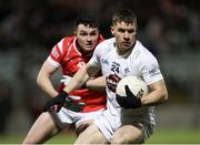 23 March 2024; Jack Sargent of Kildare in action against Tom Jackson of Louth during the Allianz Football League Division 2 match between Kildare and Louth at Netwatch Cullen Park in Carlow. Photo by Michael P Ryan/Sportsfile
