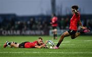 23 March 2024; Richard Kriel of Emirates Lions holds the ball in place for a conversion attempt by team-mate Jordan Hendrikse, right, during the United Rugby Championship match between Connacht and Emirates Lions at Dexcom Stadium in Galway. Photo by Piaras Ó Mídheach/Sportsfile