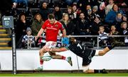 22 March 2024; Seán O’Brien of Munster scores his side's second try despite the attempts of Justin Tipuric of Ospreys during the United Rugby Championship match between Ospreys and Munster at the Swansea.com Stadium in Swansea, Wales. Photo by Gruffydd Thomas/Sportsfile