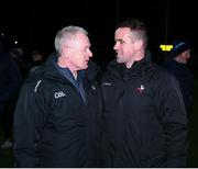 23 March 2024; Louth manager Ger Brennan is congratulated by Louth county board chairman Sean McClean after the Allianz Football League Division 2 match between Kildare and Louth at Netwatch Cullen Park in Carlow. Photo by Michael P Ryan/Sportsfile