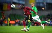 23 March 2024; Amadou Onana of Belgium in action against Adam Idah of Republic of Ireland during the international friendly match between Republic of Ireland and Belgium at the Aviva Stadium in Dublin. Photo by Seb Daly/Sportsfile