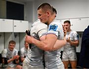 23 March 2024; Diarmuid Mangan of Leinster is presented with his first Leinster cap by teammate Sam Prendergast after making his Leinster debut in the United Rugby Championship match between Zebre Parma and Leinster at Stadio Sergio Lanfranchi in Parma, Italy. Photo by Harry Murphy/Sportsfile