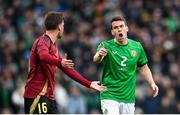 23 March 2024; Seamus Coleman of Republic of Ireland and Olivier Deman of Belgium during the international friendly match between Republic of Ireland and Belgium at the Aviva Stadium in Dublin. Photo by Seb Daly/Sportsfile