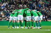 23 March 2024; Republic of Ireland players huddle before the international friendly match between Republic of Ireland and Belgium at the Aviva Stadium in Dublin. Photo by Stephen McCarthy/Sportsfile