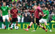 23 March 2024; Arthur Vermeeren of Belgium in action against Robbie Brady of Republic of Ireland during the international friendly match between Republic of Ireland and Belgium at the Aviva Stadium in Dublin. Photo by Stephen McCarthy/Sportsfile