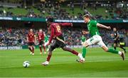 23 March 2024; Johan Bakayoko of Belgium in action against Nathan Collins of Republic of Ireland during the international friendly match between Republic of Ireland and Belgium at the Aviva Stadium in Dublin. Photo by Stephen McCarthy/Sportsfile