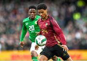23 March 2024; Koni De Winter of Belgium in action against Chiedozie Ogbene of Republic of Ireland during the international friendly match between Republic of Ireland and Belgium at the Aviva Stadium in Dublin. Photo by Stephen McCarthy/Sportsfile