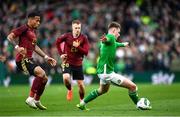 23 March 2024; Evan Ferguson of Republic of Ireland in action against Aster Vranckx of Belgium during the international friendly match between Republic of Ireland and Belgium at the Aviva Stadium in Dublin. Photo by Stephen McCarthy/Sportsfile