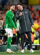 23 March 2024; Matt Doherty of Republic of Ireland and assistant coach Paddy McCarthy during the international friendly match between Republic of Ireland and Belgium at the Aviva Stadium in Dublin. Photo by Stephen McCarthy/Sportsfile