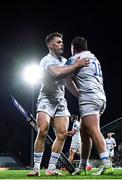 23 March 2024; Rob Russell of Leinster celebrates with teammate John McKee after scoring his side's fifth try  during the United Rugby Championship match between Zebre Parma and Leinster at Stadio Sergio Lanfranchi in Parma, Italy. Photo by Harry Murphy/Sportsfile