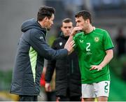 23 March 2024; Republic of Ireland assistant coach Paddy McCarthy and Seamus Coleman during the international friendly match between Republic of Ireland and Belgium at the Aviva Stadium in Dublin. Photo by Stephen McCarthy/Sportsfile